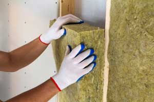 Wall insulation reduces heating and cooling costs